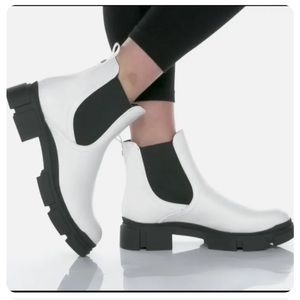 NBW. Brand new. Nine West white boot with lug sole